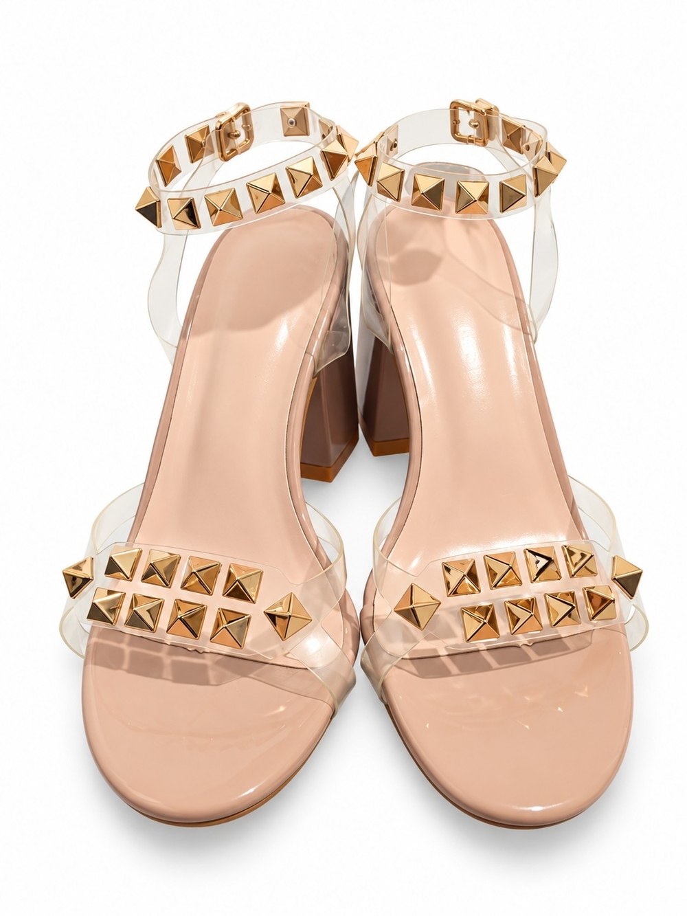 Clear PVC block heel sandals with gold stud details in nude. Features transparen